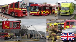 Many fire trucks on scene and firefighters in action at a warehouse fire [upl. by Aileduab]